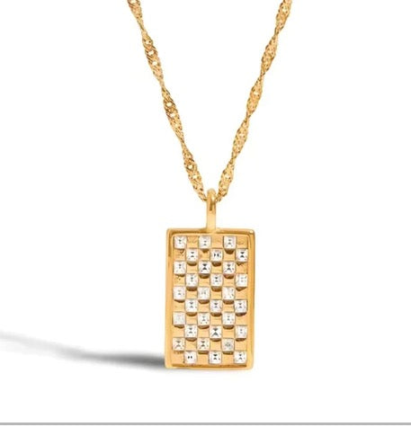 Gold Checkered Crystal Pendant Necklace – Luxury With a Modern Edge